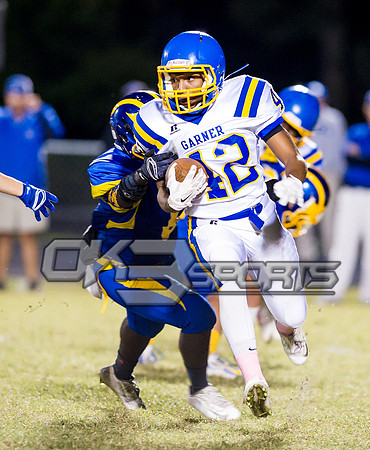 Olen C. Kelley III's coverage of the Garner Trojans and East Wake Warriors football game