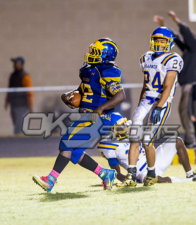 Olen C. Kelley III's coverage of the Garner Trojans and East Wake Warriors football game