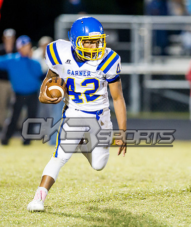 Olen C. Kelley III's coverage of the Garner Trojans and East Wake Warriors football game
