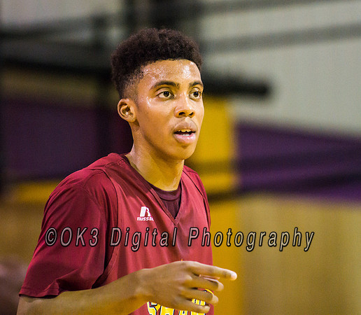 Olen C. Kelley III's coverage of the Garnet and White benefit scrimmage basketball game